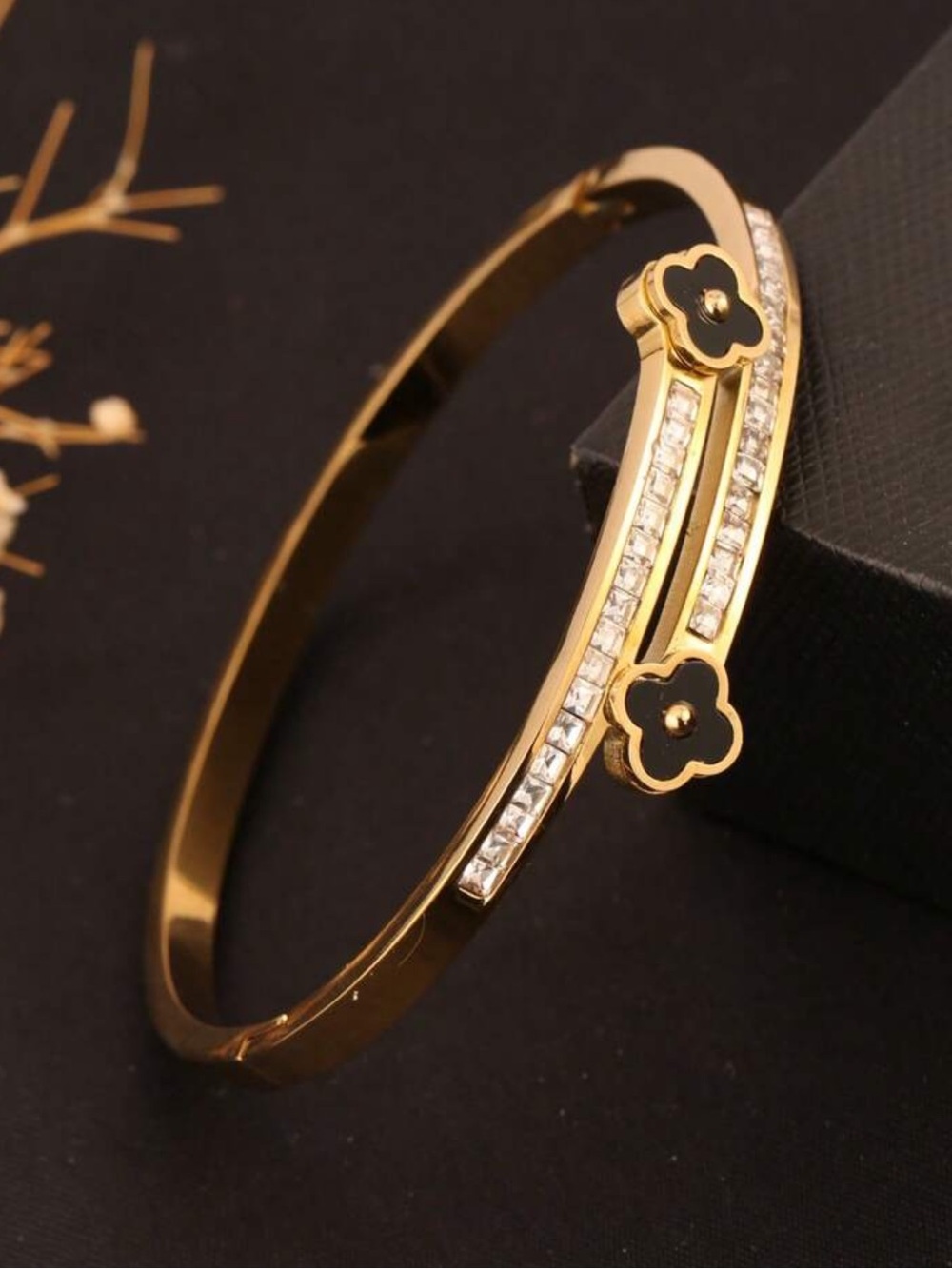 Kohl's Gold-Tone Bangle with Black Flower Accents